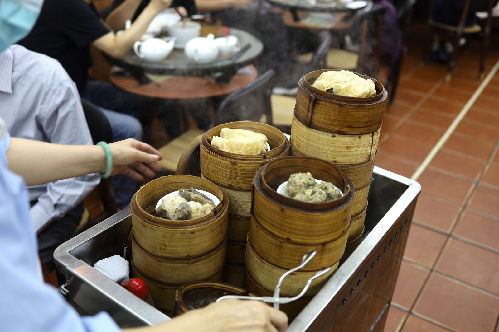 The tradition of serving DIm Sum with steamer carts