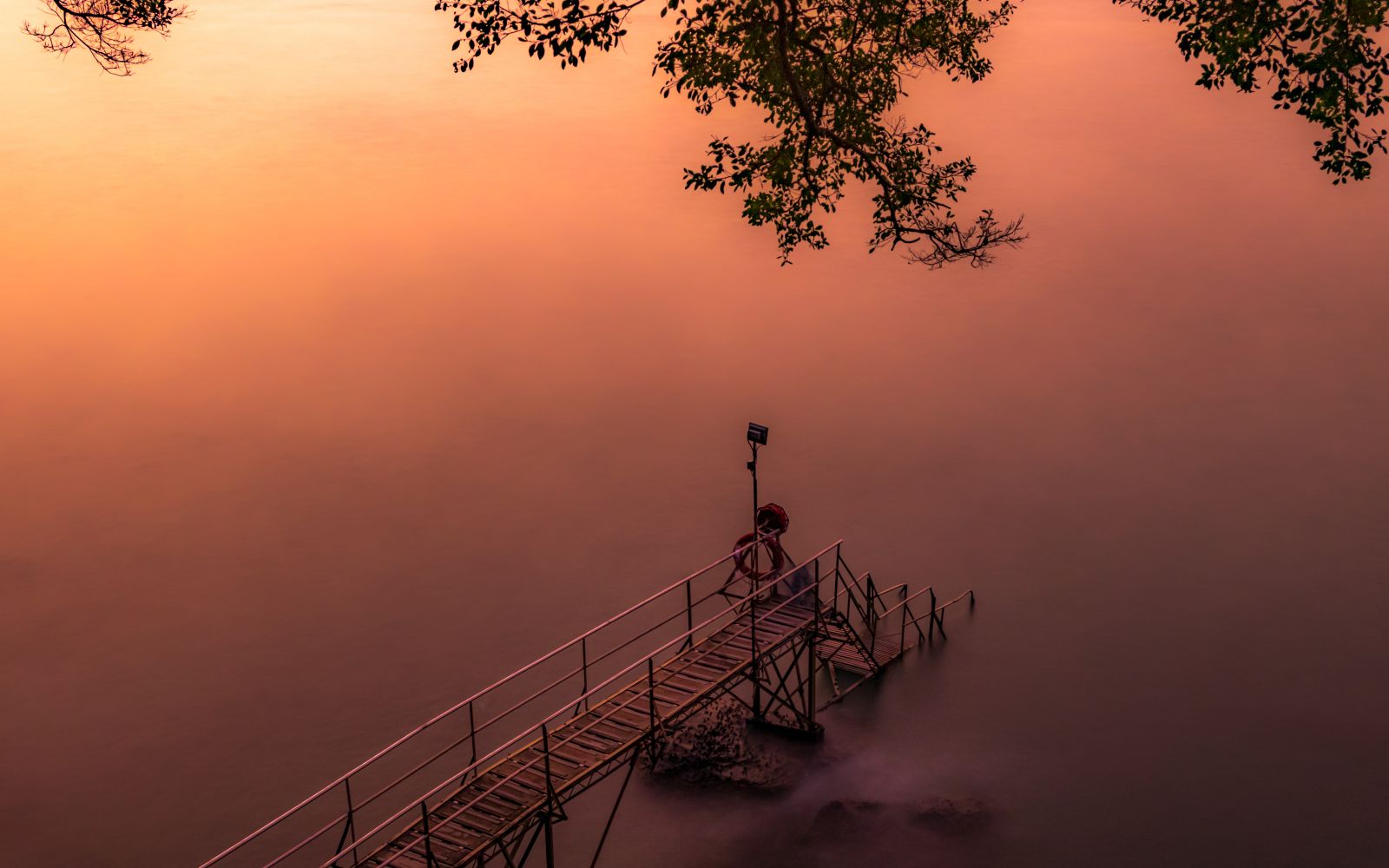 Capture the swimming shed when there is a sunset