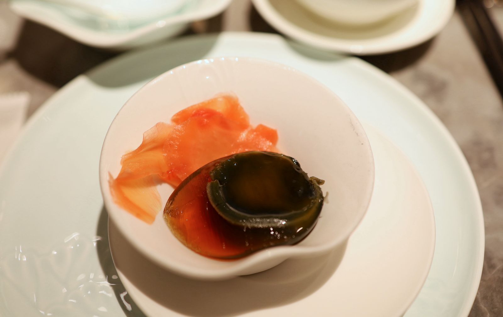 preserved eggs with pickled ginger.