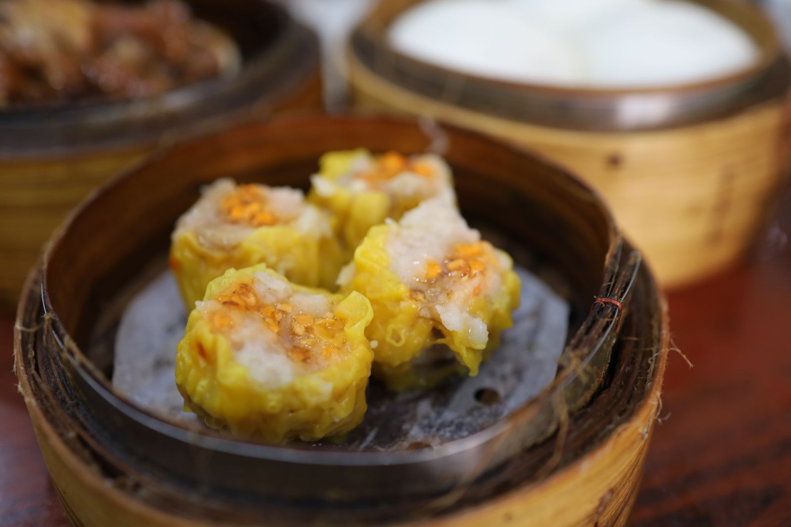 Shumai (燒賣) are steamed pork dumplings.