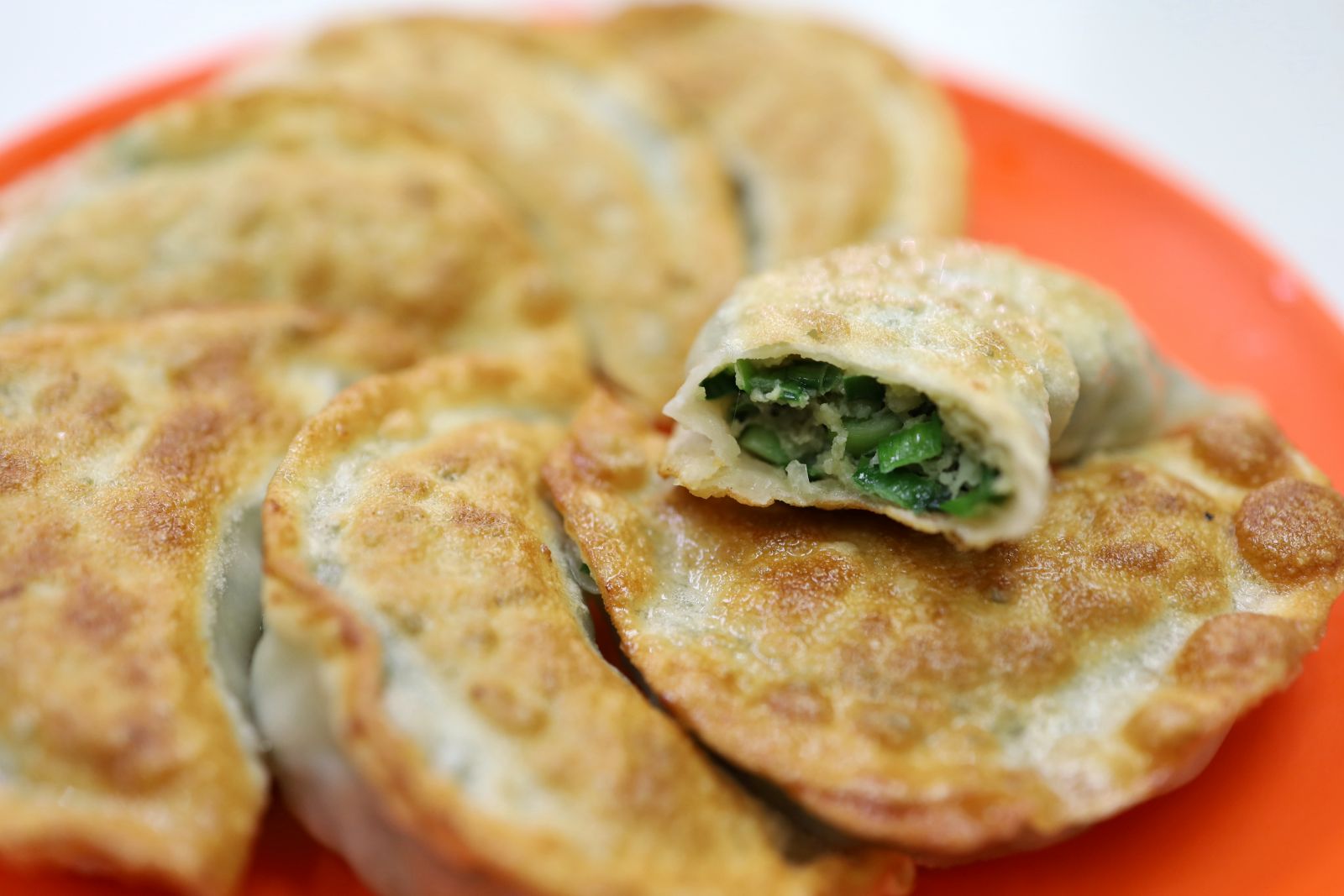 Pan-fried dumplings would be more crispy. 