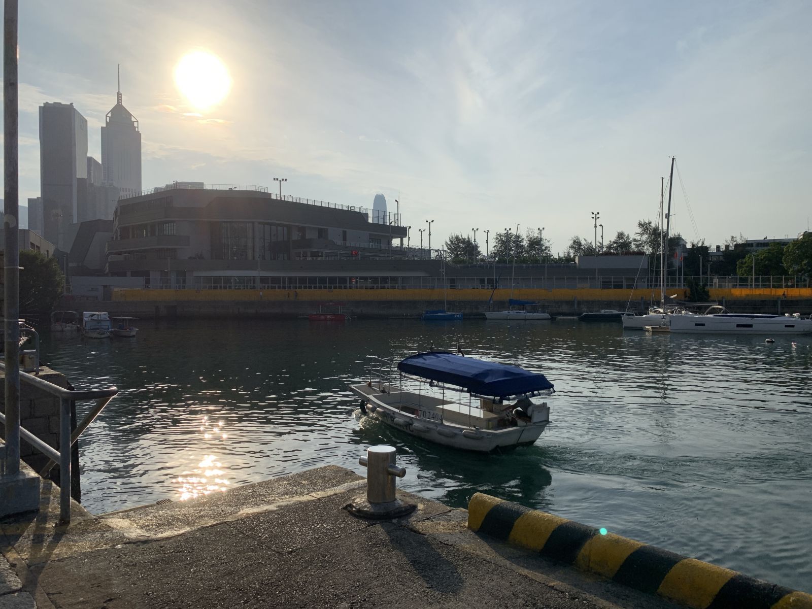 off the bridge, turn right, and continue along the road beside the yacht club