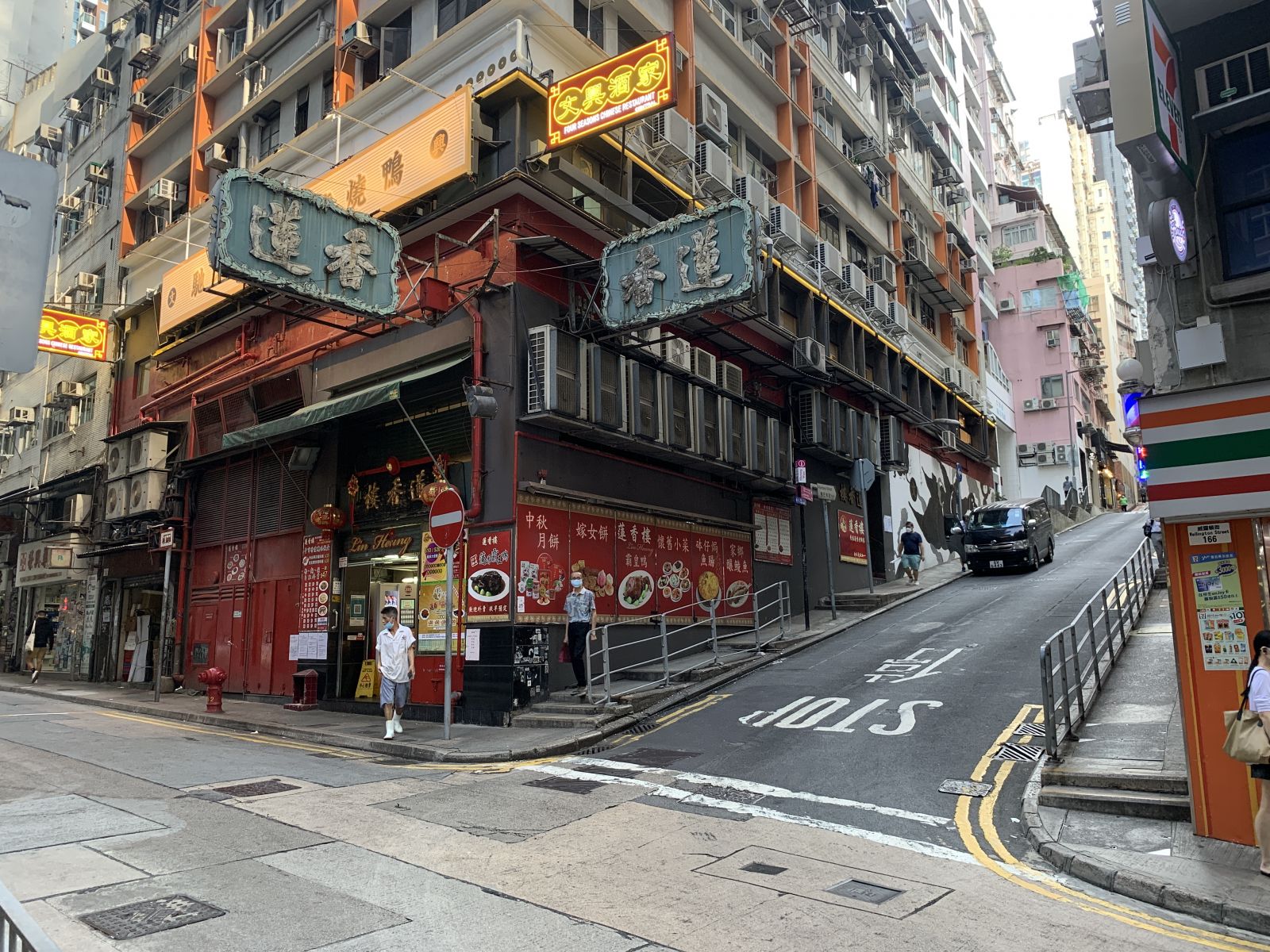 Upon spotting the 7-11 convenience store, turn right and go up the slope entering Aberdeen Street