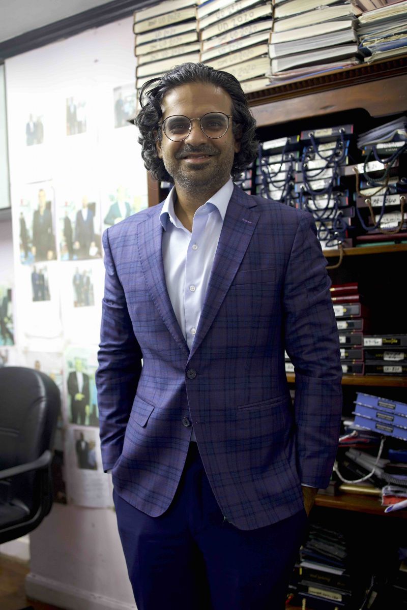 Larry Rashmi's son, the vice president of Rashmi Custom Tailor wearing their own design. 