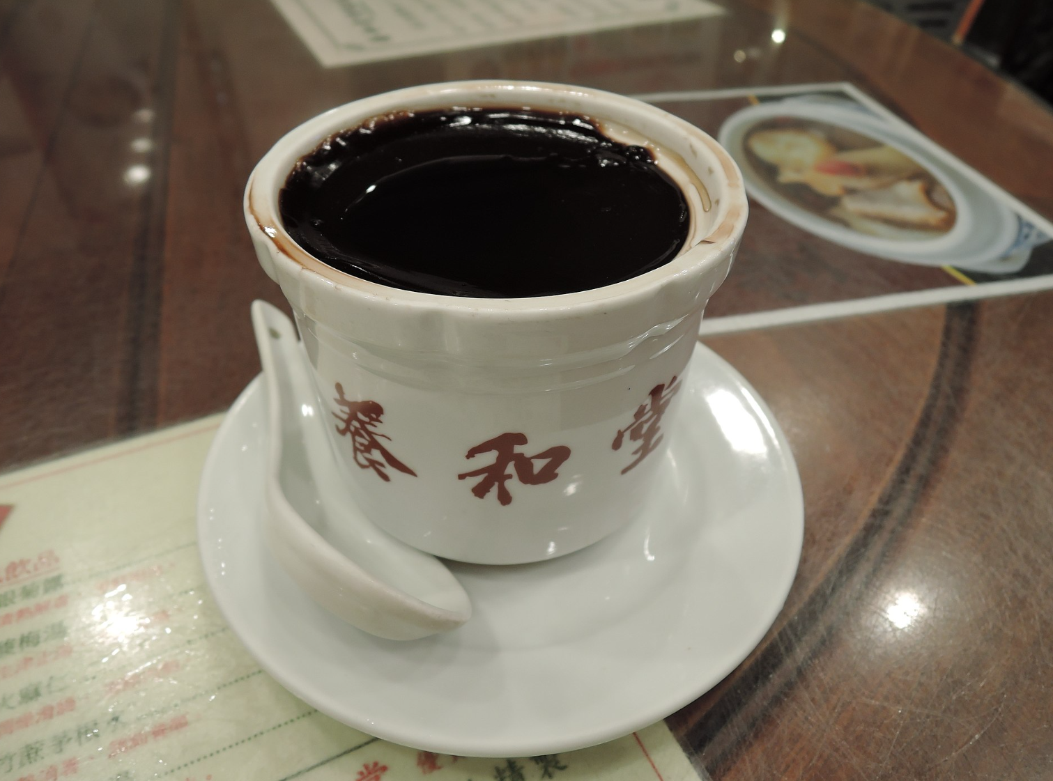 A  bowl of tortoise jelly (龜苓膏) from in the Chinese herbal tea shop